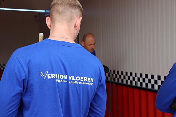 Achterkant van shirt Verbion Vloeren